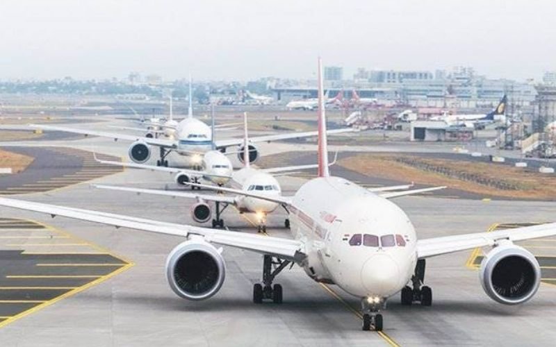 domestic flight standing on runway