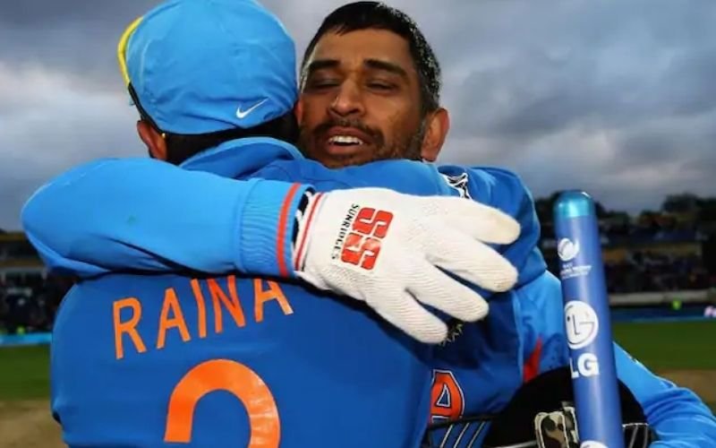 Dhoni And Raina hugging